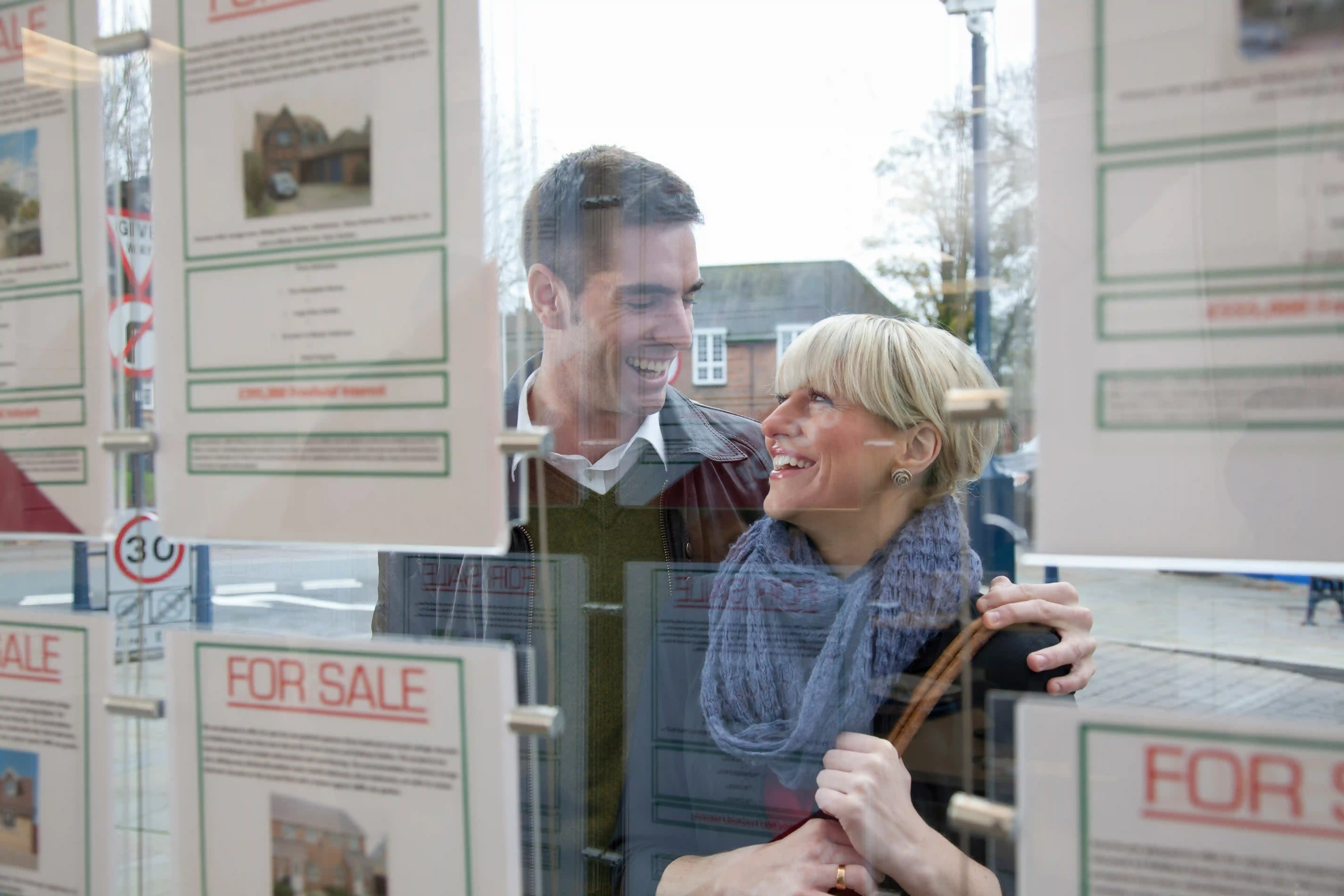 Couple looking at real estate listings