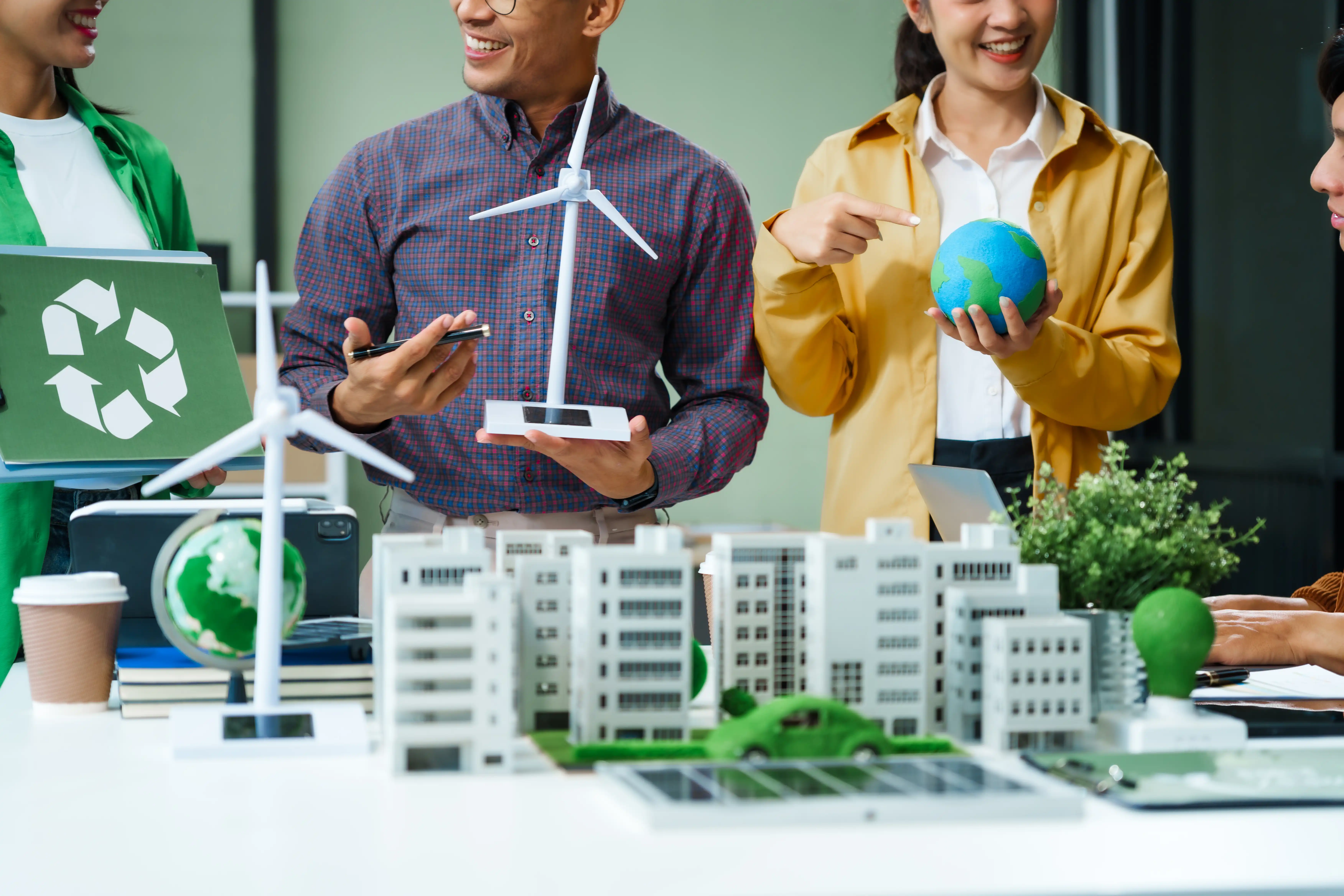 Sustainable urban planning in Berlin – building and wind turbine models symbolize green infrastructure.