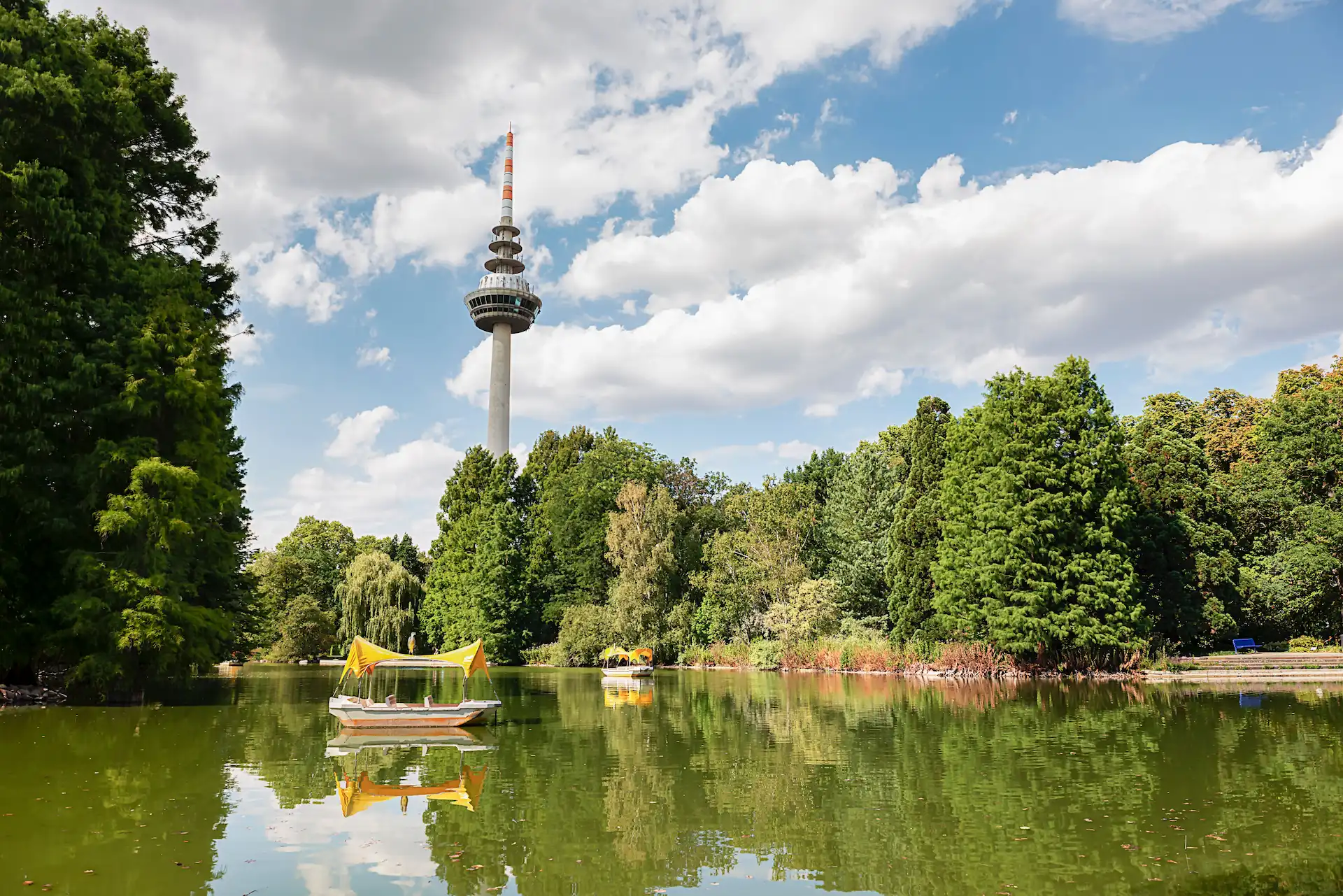Berlin radio tower above a lake – connection between nature and urban infrastructure.
