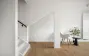 Wohnbereich mit Treppe und Eichenparkett