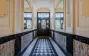 elegant-lobby-checkered-floor-berlin-apartment-building