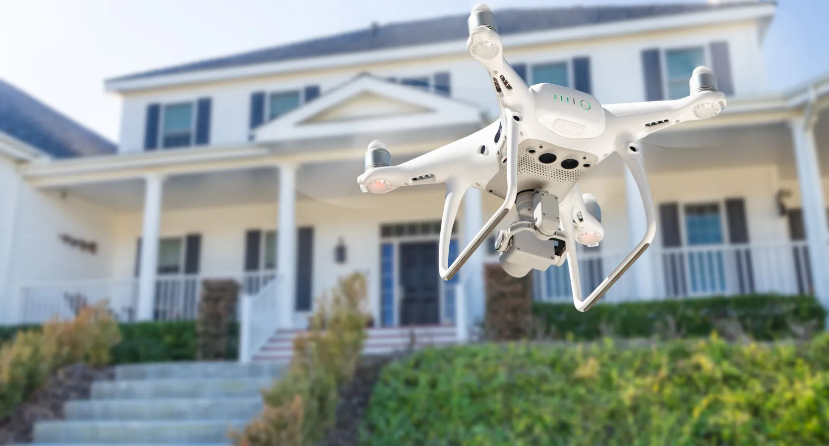 Real estate agent Berlin – modern drone shot of a house for professional real estate photography and property listings.