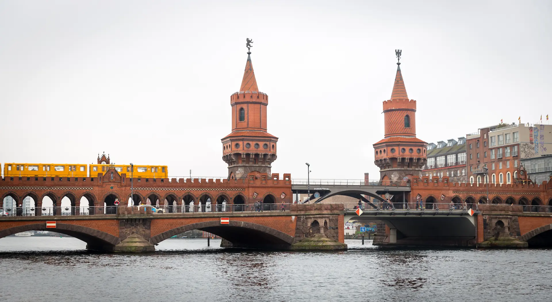 U Bahn train crossing Oberbaum Bridge in Berlin